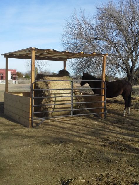 Our round bale feeder.  We've completely eliminated hay waste! Round Bale Hay Feeder, Hay Hut, Diy Hay Feeder, Round Bale Feeder, Hay Feeder For Horses, Horse Feeder, Horse Shed, Horse Farm Ideas, Horse Hay