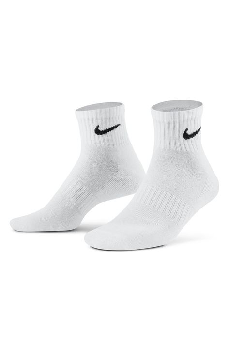 Power through your workout with the Nike Everyday Cushioned Socks. The thick terry sole gives you extra comfort for footdrills and lifts, while a ribbed arch band wraps your midfoot for a supportive feel. Pack of three pairs  71% cotton, 26% polyester, 2% spandex, 1% nylon Machine wash, tumble dry  Imported Nike Socks Women, White Nike Socks, Nike Basketball Socks, Nike Crew Socks, Pretty Shoes Sneakers, Nike Socks, Basketball Socks, Sock Packs, Cute Preppy Outfits