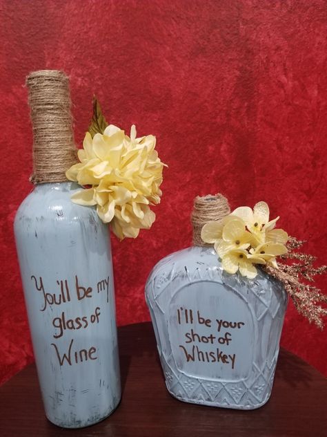 Painted wine and whiskey bottle Wine And Whiskey Bottle Centerpieces, Wine Bottle Wedding Centerpieces, Wedding Planning Notebook, Planning Notebook, Wedding Wine Bottles, Wedding Renewal, Bottle Centerpieces, Cricut Explore Projects, Rustic Wedding Centerpieces