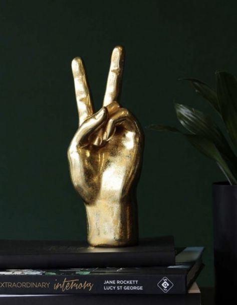 Peace Hand, Dark Green Walls, Pile Of Books, Rockett St George, Hand Sign, Accessories Display, Wall Background, Hand Candle, Décor Diy