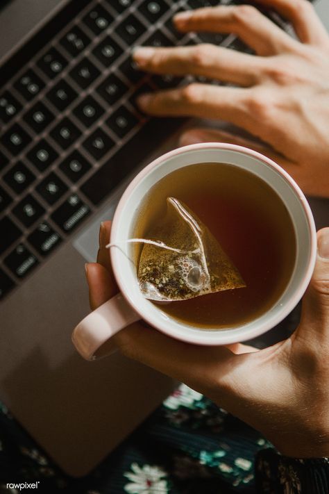 Woman holding a cup of tea while using a laptop | premium image by rawpixel.com / McKinsey Drinking Tea Photography, Holding A Cup Of Tea, Creative Backyard, Photography Ideas At Home, Herbal Teas Recipes, Iced Tea Recipes, Tea And Books, Coffee Photography, A Cup Of Tea