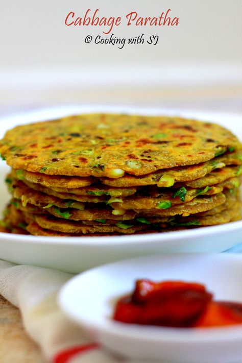 cabbage paratha Cabbage Paratha Recipe, Cabbage Recipes Indian, Cabbage Paratha, Easy Indian Snacks, Lunch Recipes Indian, Indian Flat Bread, Flat Breads, Spicy Snacks Recipes, Breakfast Recipes Indian