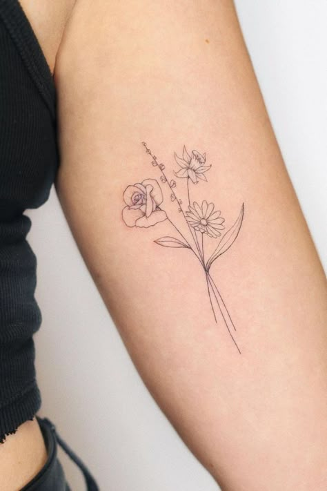 Tattoo Ideas For Birth Date, Minimalist Flower Tattoo Arm, Daffodil Rose Poppy Tattoo, Group Of Flowers Tattoo, Birth Flower Tattoos Arm, Daffodil And Carnation Tattoo, Row Of Flowers Tattoo, 5 Flower Bouquet Tattoo, Delicate Flower Tattoo Ribs