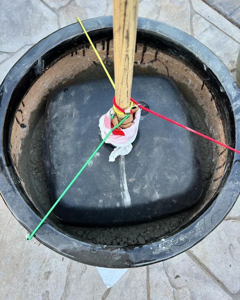 One of my projects this week was to make a patio umbrella base that would actually hold the umbrella. A heavy concrete flower pot, 2 bags of concrete, the original water-filled base that held it when it was in our old patio table, a Prosecco cork, a wooden dowel and bungees. And LOOK!! It worked!! Next up… clean the umbrella and plant flowers in the top section of the base. #patioumbrella #patioumbrellabase #sakrete #diy #diygardenprojects @sakrete Diy Garden Projects, Patio Table, Flower Pot, Patio Umbrella, Flower Pots, Planting Flowers, Cork, The Original, Umbrella