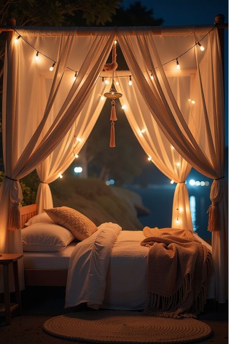 Low-angle view of a DIY boho canopy bed with dramatic nighttime lighting Canopy Boho Bed, Rustic Canopy Bed Ideas, Bed With Canopy, Canopy Bed Ideas, Boho Bedroom Decor Ideas, Boho Space, Diy Boho, Free Spirit Style, Floor Bed