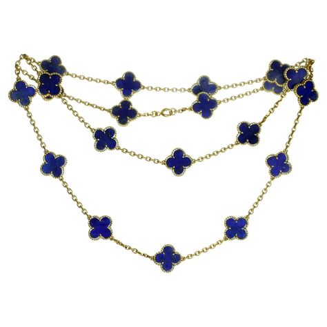 This gorgeous rare Van Cleef & Arpels 20-motif lucky clover necklace from the iconic Alhambra collection is crafted in 18k yellow gold and inlaid with blue lapis lazuli in round bead settings. Made in France circa 1980s. Measurements: 0.59" (15mm) width, 31.5" (80cm) length. Pre-owned. Shows some normal signs of wear. Comes with original pouch and VCA certificate of authenticity. Van Cleef Necklace, Navy Blue Jewelry, Alhambra Necklace, Navy Jewelry, Blue Jewelry Set, Luxury Things, Rare Vans, Van Cleef And Arpels Jewelry, Van Cleef & Arpels