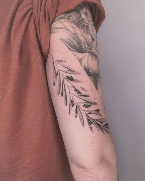 Explore Top Olive Tattoo Designs for a Timeless Style Statement Arm Branch Tattoo, Green Olive Branch Tattoo, Olive Tree Tattoos, Farm Tattoo, Olive Tattoo, Arm Wrap Tattoo, Carp Tattoo, Olive Branch Tattoo, Jewel Tattoo