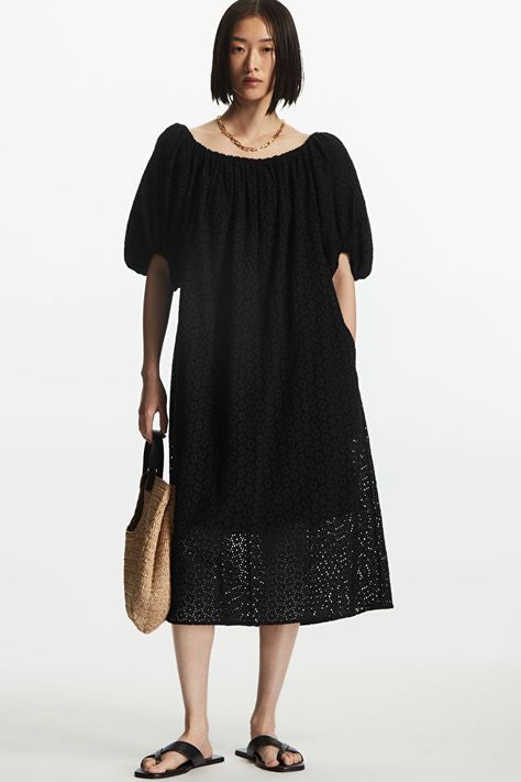 Made from cotton embroidered using a broderie anglaise technique, this voluminous black dress has gathered puff sleeves and is designed to hit mid-calf. The off-the-shoulder neckline is the perfect silhouette for summer. - Relaxed fit - Removable tonal belt - Lined to the knee Shell Lining: 100% Cotton / Machine wash cold Back length of size EU 36 is 105.5cm / Model is 178cm tall and wearing a size EU 36 Black Dress Aesthetic, Eyelet Midi Dress, Dress Aesthetic, Woman Silhouette, Black Midi Dress, Summer Dresses For Women, Aesthetic Fashion, Puff Sleeves, Occasion Dresses