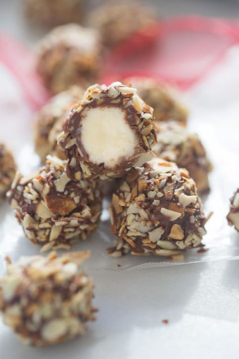 A stack of vanilla creme balls with a bite taken out of the one on top, revealing the vanilla creme filling. Bake Sweets, Tastes Better From Scratch, Candy Recipes Homemade, Easy Snack Recipes, Desserts Recipes, Balls Recipe, Toasted Almonds, Sweets Desserts, Candy Recipes