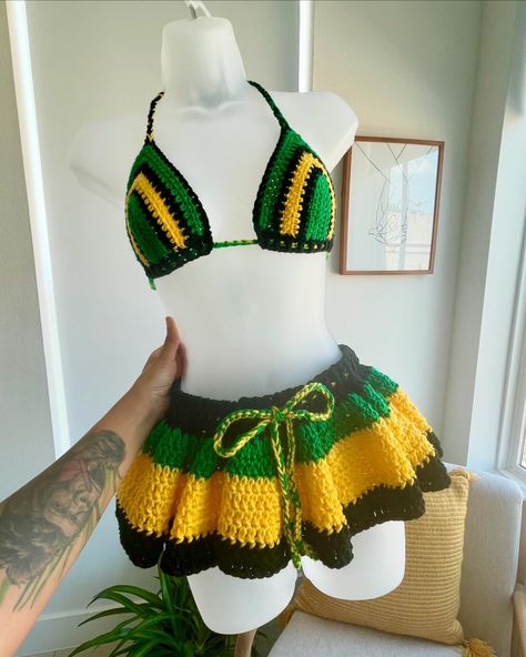 Jamaican Mini Skirt Set. 🫶🏽🇯🇲 DM ME TO ORDER 🛍️ #stitch26fiberco #stitch26 #stitchedbyadri #crochet #jamaica #crochetersoftiktok #crochettiktok #handmade #ootd #grwm #knit #dallas #texas #bikini Jamaica Crochet Outfits, Jamaica Crochet, Jamaican Crochet, Knitted Skirt, Crochet Bikinis, Crochet Bathing Suit, Bathing Suit Skirt, Crochet Bathing Suits, Bikinis Crochet