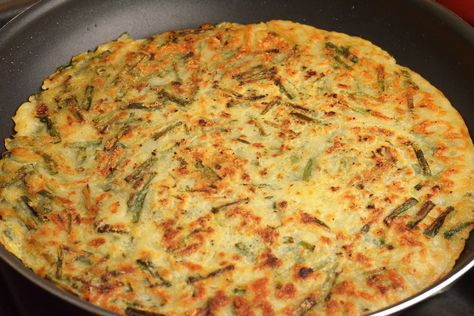 Korean Garlic Chives Pancake (Buchujeon) | Asian Inspirations Korean Onion Pancake, Chives Pancake, Korean Chive Pancakes, Korean Savory Pancake, Chive Pancake, Korean Garlic, Korean Spring Onion Pancake, Crispy Pancakes, Chinese Garlic