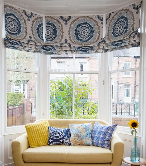 Bay window ideas: ways to dress bays with blinds, curtains and shutters Bay Window Roman Shades, Roman Blinds Bay Window, Bay Windows Ideas, Bay Window Curtains Living Room, Bay Window Dressing, Victorian Bay Window, Shutters With Curtains, Bay Window Ideas, Bay Window Blinds