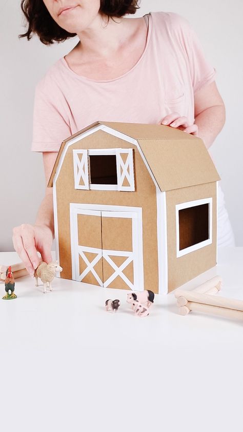 cardboardfolk on Instagram: Cardboard Barn! I recall promising a tutorial for my cardboard box barn about 9 months ago. Better late than never right?! Music choice is… Diy Carton Toys, Cardboard Toys Diy, Cardboard Farm Animals, Cardboard Farm, Barn Craft, Wicked Crafts, Kids Barn, Barn Crafts, Cardboard Play