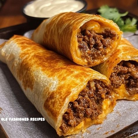 Introduction: If you’re craving a Mexican-inspired dish that’s crispy on the outside and bursting with flavor on the inside, chimichangas are a perfect choice. These deep-fried burrito-style wraps are packed ... Read more Beef And Cheese Chimichangas Air Fryer, Miguel's Cooking With Fire, Air Fryer Chimichangas, Beef And Cheese Chimichangas, Flour Tortillas, Melted Cheese, Tortillas, Deep Fried, Burritos