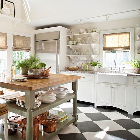 Bold patterned tile makes a statement in this light and airy kitchen. See more ideas for kitchen floors: http://www.bhg.com/kitchen/flooring/fresh-ideas-for-kitchen-floors/?socsrc=bhgpin042413patterntile=4 Cottage Style Decor, English Cottage Style, Cottage Kitchens, Kitchen On A Budget, Trendy Kitchen, Farmhouse Sink, Cottage Kitchen, Cabinet Colors, Garden Cottage