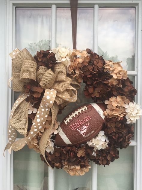 Football fall burlap wreath Fall Football Porch Decor, Football Mesh Wreath Diy, Football Season Wreaths, Sports Wreaths Football, Football Porch Decorating Ideas, Diy Football Wreath, Fall Football Front Porch Decor, Fall Football Decor Ideas For The Home, Football Diy Decor