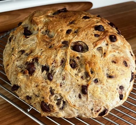 Quick and Easy Chocolate Chip Cookie Bread - Chocolate chip bread is delicious for several reasons:Sweetness: Chocolate chip bread is sweet, thanks to the sugar and chocolate chips, which are both high in natural sugars. This combination of textures can be very appealing to our taste buds. #chocolatechipbread#homemadebread#bakingfromscratch#chocolatelover#sweettreats#foodporn#bakersofinstagram Dutch Oven Sweet Breads, Artisan Bread Inclusions, Chocolate Chip Breakfast Bread, Sweet Artisan Bread, Chocolate Chip Cookie Focaccia, Cinnamon Chocolate Chip Bread, Chocolate Chip Cookie Bread, Dutch Oven Sweet Bread Recipes, Chocolate Chip Soda Bread