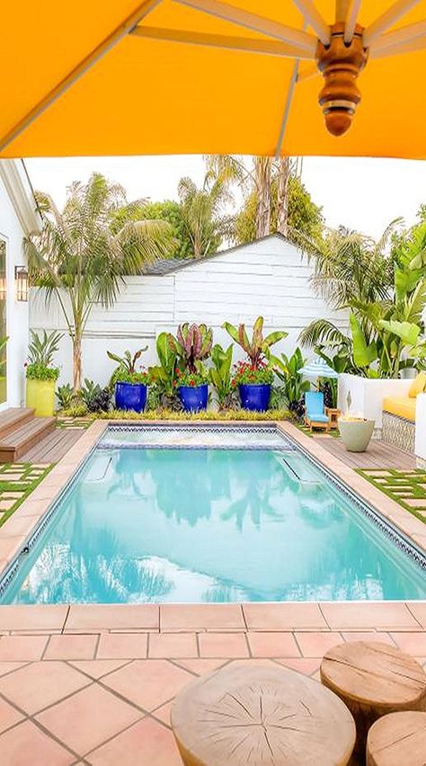 Tried and True Terra Cotta Heat up your white exterior walls with a Mediterranean-inspired terra-cotta tile pool patio. This vibrant space boasts wall-to-wall terra-cotta tilework laid in a contrasting diamond and brick pattern to create a striking symmetrical display. Pool Deck Design, Mid Century Pool, Tile Pool, Stone Water Features, Pool Decking, Hgtv Dream Homes, Deck And Patio, Courtyard Pool, Freeform Pools