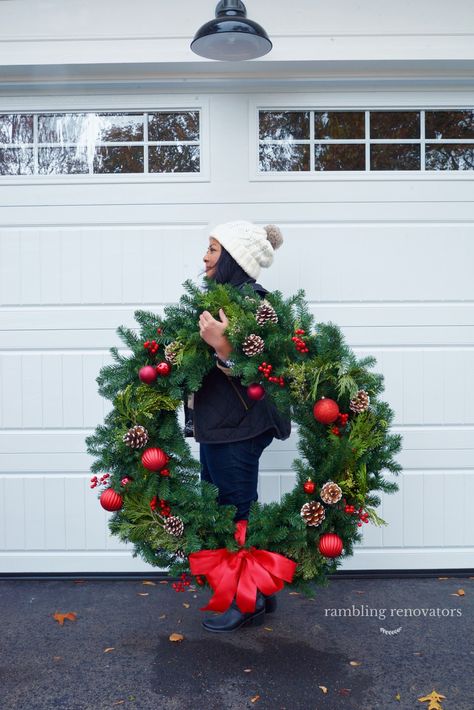 classic christmas decorations, colonial house with wreaths on windows, wreaths on exterior windows, wreath on chimney, large exterior wreath Large Outdoor Christmas Wreaths On House, Large Wreath Outdoor, Giant Christmas Wreath, Exterior Christmas Decorations, Outdoor Christmas Wreaths, Large Christmas Wreath, Classic Christmas Decorations, Christmas Window Decorations, Christmas Decorations Wreaths