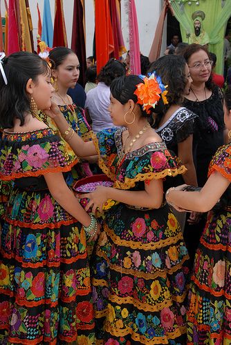 When I started researching for my  "rainbow wedding" complete with hothouse flowers and kool aid kisses, this style of dress was seriously high up on my list! Mexican Traditional Clothing Women, Mexico Colors, Traditional Mexican Dress, Ballet Folklorico, Mexican Textiles, Mexican Traditions, Travel Mexico, Mexican Fashion, Mexican Heritage