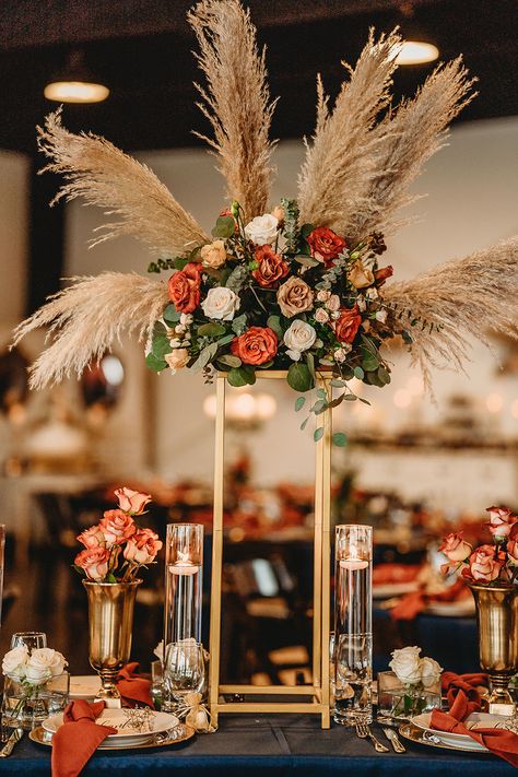 Fall Wedding Themes Rustic, Boho Reception Decor Indoor, Green Floral Arrangements Wedding, Art Deco Fall Wedding, Center Piece Wedding Fall, Table Centerpieces Fall Wedding, Fall Round Table Wedding Decor, Boho Orange, Teal And Burnt Orange Wedding Table Decor