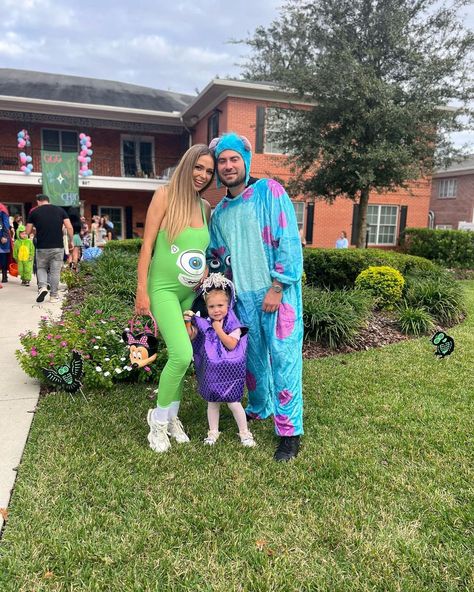 Family Monsters Inc Disney Costume: Sully, Mike Wazowski, and Boo. Pregnant Halloween Costume Idea Monsters Inc Pregnant Costume, Monsters Inc Family Costume Pregnant, Monsters Inc Family Costume, Pregnant Halloween Costume, Mike Wazowski Costume, Wagon Costume, Sully Costume, Pregnancy Costumes, Pregnant Halloween Costumes