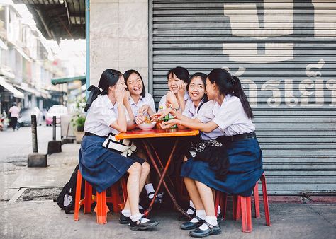 Thai high school student sitting at street restaurant in Bangkok by Nabi Tang High School Students In Uniform, High School Photoshoot, Thai School Uniform, Student Photoshoot, Thai Photography, Students Photography, School Reference, Yearbook Photoshoot, Street Restaurant