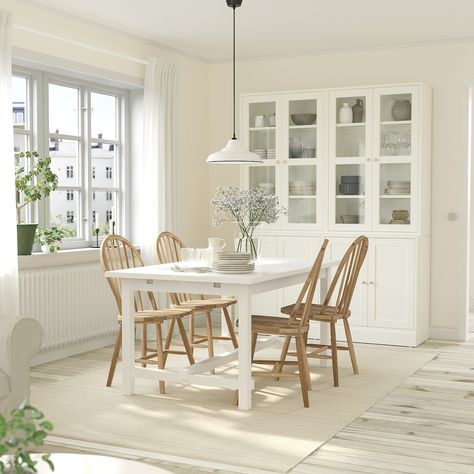 White kitchen with wood island