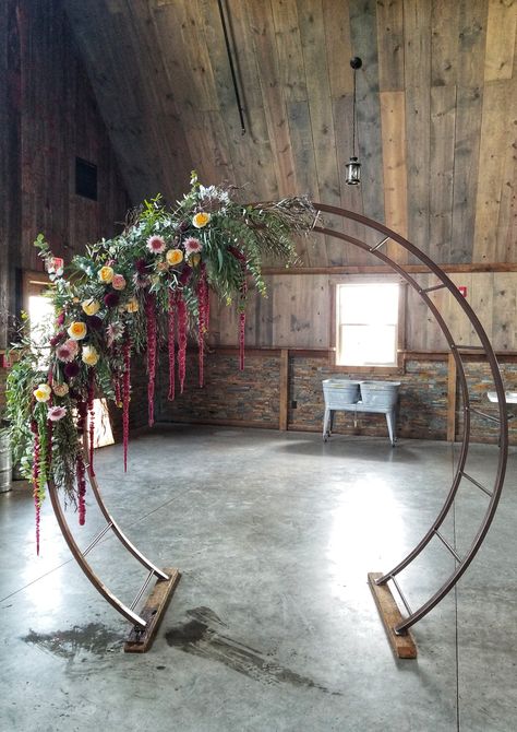 Gorgeous circle ceremony arch with red hanging amaranthus floral, pale pink and pale yellow roses and dusty mauve mums. Wedding ceremony arch. Circle Ceremony, Blue Red Wedding, Hanging Amaranthus, Mums Wedding, Circle Arch, Wedding Arbors, Wedding Ceremony Arch, Secret Garden Wedding, Wedding Arbour