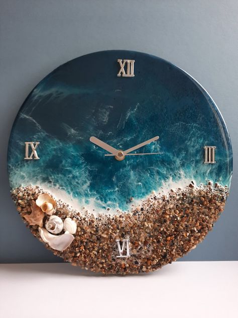 Resin clock with natural seashells Resin Art With Seashells, Epoxy Resin Clocks, Resin Ocean Clock, Clock Resin Art, Epoxy Resin Clock Ideas, Clock Ideas Creative, Resin Wall Clock Design, Clock Painting Ideas, Resin Clock Diy