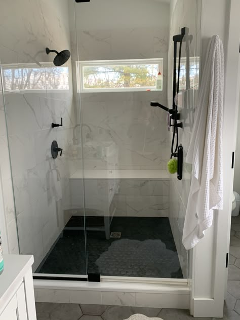 White Marble Shower With Black Floor, Walk In Shower Black Hardware, Black And White Marble Bathroom, Master Shower Tile, White Marble Shower, Tile Walk In Shower, White Marble Design, Shower Renovation, White Marble Bathrooms