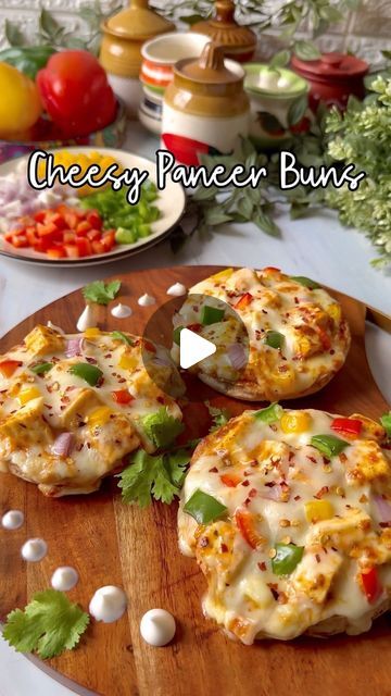 Foodklick on Instagram: "✨ Cheesy Paneer Buns ✨

Cheesy paneer buns are soft, fluffy rolls stuffed with a spiced paneer mixture and melted cheese, creating a delightful fusion of flavors. Perfect as a snack or appetizer, these buns are baked to golden perfection, offering a gooey, cheesy center that pairs wonderfully with chutneys or sauces.

Ingredients:
Burger Buns
200g paneer, cubes
1/2 cup grated cheese (mozzarella or cheddar)
1 small onion, chopped
Bellpeppers
1 tablespoon Mayonnaise 
1 teaspoon Schezwan Sauce
1 teaspoon Mixed Herbs

.
.
.
#cheese #paneer #buns #burger #garlic #garlicbread #cheesy #italian #food #reels #reelitfeelit #foodreels #reelsexplore #tasty #indianfood #tasty #desikhana #foodbloggers #tasteofindia #foodreelsinindia #desifood #trending #reelvideo #recipe #tasty Fluffy Rolls, Food Reels, Schezwan Sauce, Cheese Mozzarella, Desi Food, Burger Buns, Grated Cheese, Melted Cheese, Garlic Bread