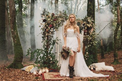 Boho Bride in  Cold Shoulder Wedding Dress with Fringe Detail and Black Lace Wedding Boots | Lace Wedding Boots, Leather Jackets and Macrame Wedding Decor for a Boho Celebration in the Woods by Emma-Jane Photography Wedding Dress With Fringe, Cold Shoulder Wedding Dress, Lace Wedding Boots, Macrame Wedding Decor, Woodland Wedding Inspiration, Black Lace Wedding, Boho Wedding Cake, Shoulder Wedding Dress, Dress With Fringe