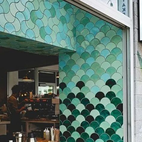 Mercury Mosaics on Instagram: "Coffee, flowers, and floor to ceiling tile? What more could you want! ☕️ - Photography - @bluestonelane - Large Moroccan Fish Scales – 12W Blue Bell, 32 Canton Jade, 1065 Mint Julep, 1017E Sea Mist, 1017W Sea Mist, 1036W Bluegrass - #MercuryMosaics #FemaleFounded #HandmadeTiles #HandmadeCeramics #CommercialDesign #CafeDesign #MosaicArt #Ombre #TileDesign" Ombre Tile, Floor To Ceiling Tile, Mermaid Tile, Moroccan Fish, Moroccan Fish Scale, Mercury Mosaics, Instagram Coffee, Tile Mosaic, Blue Bell