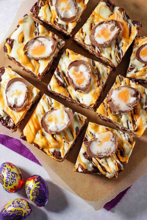 Super easy, no bake, utterly delicious Creme Egg Rocky Road recipe. Great for bake sales and making with kids, the best Easter chocolate treat! This no fail chocolate dessert recipe is a must make for Easter. #easter #rockyroad #tamingtwins #easterrecipe via @tamingtwins Cadbury Creme Egg Recipes, Mini Egg Cheesecake, Rocky Road Recipe, Cadbury Creme Egg, Easy Chocolate Desserts, Mini Egg, Creme Egg, Easter Baking, Chocolate Dessert Recipes