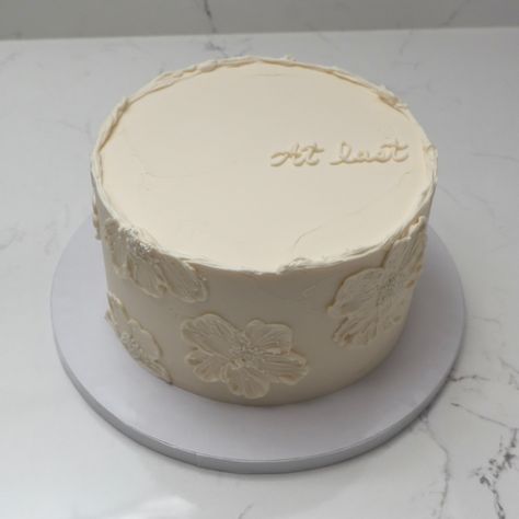 At last 💍 - Cake Details - Size: Standard 7” (two layers) #emmacakes #emmacakesseattle #seattle #seattlecakes #customcakes #wedding #weddingcakes #vintagewedding Bridal Shower Simple Cake, Wedding Cake Ideas One Tier, Wedding Cake Writing, Wedding Cake Single Layer, 1 Tier Wedding Cake With Flowers, Minimalist Wedding Cake One Tier, Simple Wedding Cake Small One Tier, One Layer Wedding Cake, Simple Two Tier Wedding Cake