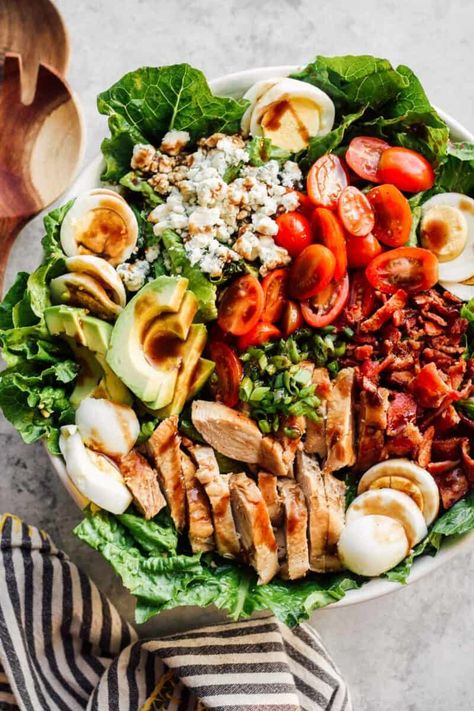 Pan seared chicken in a delicious cumin coating, colorful veggies, tangy blue cheese, bacon and lots more go into this delicious Chicken Cobb Salad. It’s one awesome salad! Perfect for lunch or dinner. Pop over to my site for the recipe! | salad recipes | chicken breast recipes | healthy dinner recipes | summer meals | Salads With Chicken, Avocado Dressing Recipe, Chicken Cobb Salad, Cumin Chicken, Classic Cobb Salad, Avocado Salad Dressing, Delicious Chicken Salad, Pan Seared Chicken, Avocado Dressing