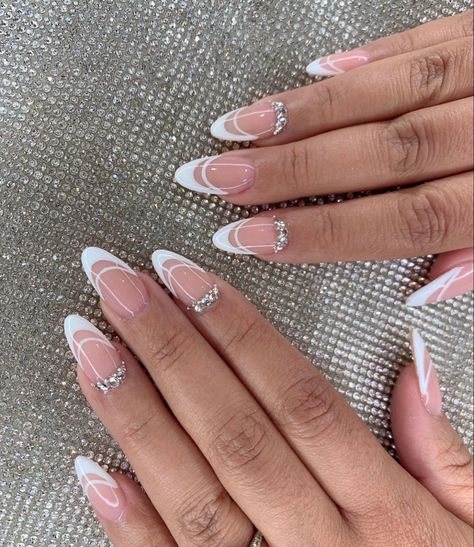 French Tip Elegant Nails, White Tip Nails With Design Almond, White Nails French Tip With Designs, French Tip Nails With Design Diamonds, White French Tip Nails With Design Short Almond, White French With Design Nails, French Tip W Design, French Tip With Crystals, Trendy Nails Ideas French Tip