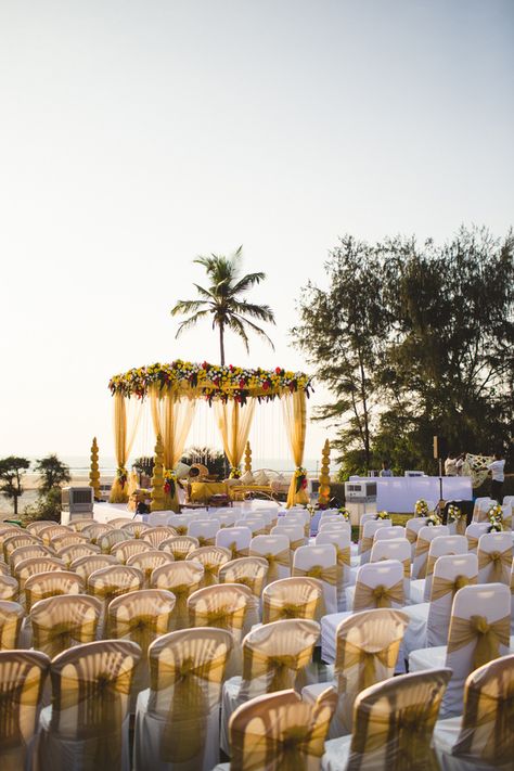 white and gold chairs Indian Beach Wedding, Gold Chairs, Wedding Photography Film, Goa Wedding, Indian Wedding Favors, Destination Wedding Decor, India Wedding, Mandap Decor, Desi Wedding Decor