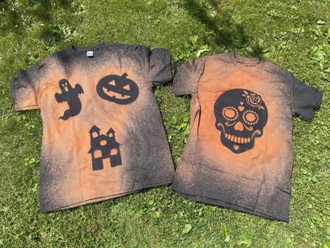 Make Your Own Halloween Bleach Spray Shirt in 10 Minutes or Less! | Diy Halloween Tshirts Bleach, Diy Bleached Halloween Shirt, Bleach Shirt With Stencil, Diy Halloween Sweatshirt Bleach, Reverse Tie Dye Halloween Shirts, Halloween Bleach Shirts Diy, Bleach Spray Shirt Diy Stencils, How To Bleach Spray Shirt Diy, How To Spray Bleach A Shirt