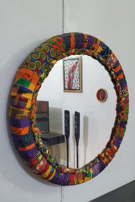 Motorcycle tire-inspired wall decor crafts Ankara Home Decor Ideas, Ankara Wall Decor, African Room Decor Ideas, African Print Decor, Diy African Decor, African House Decor, African Decor Living Room, Draps Design, African Wall Decor