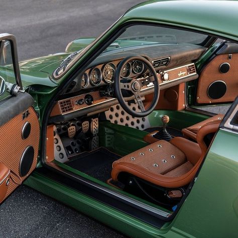 Singer Vehicle Design on Instagram: "Here’s the Redding commission.    Interior trimmed in Vivaldi with woven leather and nickel grommets.    Kauai Green Metallic exterior with ghosted stripes and Campfire Orange lettering.    #Singer #california #porsche" Porsche Singer Interior, Vintage Porsche Interior, Green Leather Aesthetic, Orange Car Interior, Green Car Interior, Car Custom Interior, E30 Interior, Miata Interior, Cool Car Interior