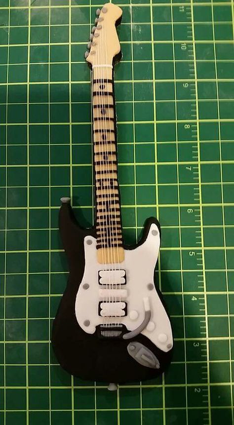 Electric guitar cake topper Electric Guitar Cake Topper, Polymer Clay Guitar, Clay Guitar, Guitar Cake Topper, Electric Guitar Cake, Guitar Cakes, Creepy Halloween Party, Guitar Crafts, Guitar Cake