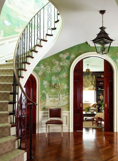 Ashley Whittaker. Architect Tom Felton rebuilt a modifed version of the circular entry hall’s sweeping staircase, a distinctive feature of the circa-1927 J.E.R. Carpenter interior. The Charles Edwards pagoda-shaped lantern plays off the hand-painted Chinoiserie-inspired wallpaper from Gracie Studio. Sconces, Chameleon Antiques. Stair runner, Stark. New York Spaces, May 2013. Wallpaper Entryway, Ashley Whittaker, Foyer Wallpaper, Wallpapered Entryway, Gracie Wallpaper, Park Avenue Apartment, Wallpaper Interior Design, Wallpaper Interior, Stair Decor