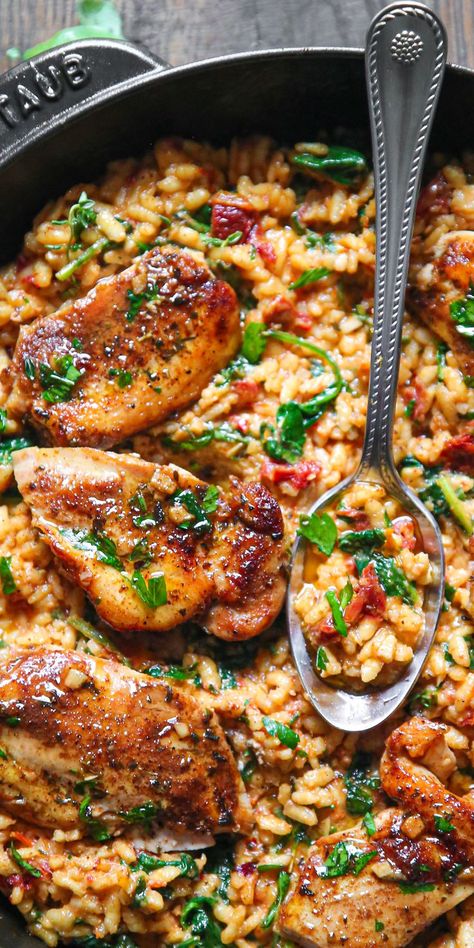 Creamy Chicken and Rice with Sun-Dried Tomatoes & Spinach in a cast iron skillet. Tomato Recipes Healthy, Skinless Boneless Chicken Thighs, Sundried Tomato Recipes, Risotto Recipes Chicken, Use Leftover Chicken, Chicken Thigh Seasoning, Sundried Tomato Chicken, Chicken Risotto, Spinach Rice