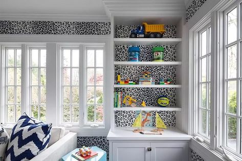 Modern Wallpaper Ideas and Inspiration | Hunker Wallpaper Behind Shelves Living Room, Wallpaper Behind Shelves, Family Playroom, Boy Nursery Design, Rooms Inspiration, Framed Windows, Market Decor, Leopard Print Wallpaper, Circle Drive