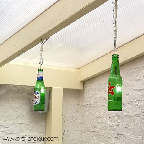 Beer Bottle Lights DIY Project | Craftaholique Bottle Lights Diy, Diy Farmhouse Light Fixtures, Bottle Light Fixture, Diy Beer Bottle, Beer Bottle Chandelier, Orb Light Fixture, Edison Bulb Light Fixtures, Beer Bottle Lights, Beer Bottle Diy