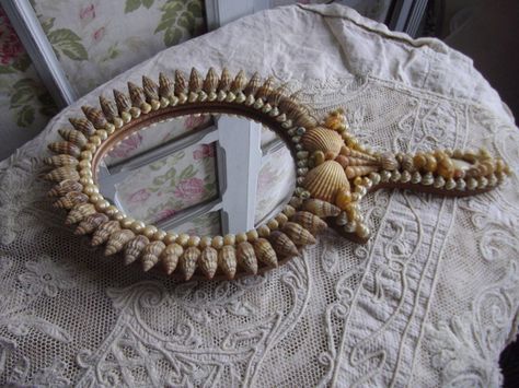 Image from: http://www.ebay.co.uk/itm/DIVINE-VINTAGE-FRENCH-SHELL-BOUDOIR-LOOKING-GLASS-HAND-MIRROR-SO-PARIC-CHIC-/330896434322?pt=UK_Collectables_VanityCollectables_SM=item4d0af6e492 Hand Mirrors, Mermaid Accessories, Shell Chandelier, Sky Art Painting, Sailors Valentine, Collections Of Objects, Dark Home Decor, Work Boxes, Cottage In The Woods