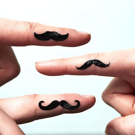 A hipster tattoo idea of the mustache inked on the finger. Color: Black. Tags: Matching, Hipster Mustache Tattoo Ideas, Mustache Tattoo On Finger, Mustache Tattoo, Middle Finger Tattoos, Origami Tattoo, Finger Tattoo Designs, Cool Arm Tattoos, Aries Tattoo, Sibling Tattoos