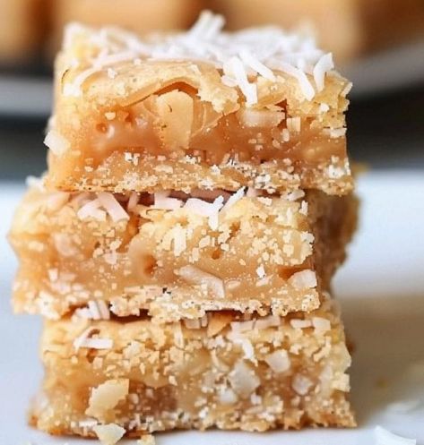 Coconut Chewies Recipe - Recipecs Coconut Chewies Bars, Shredded Coconut Dessert, Unsweetened Shredded Coconut Recipes, Flaked Coconut Recipes, Shredded Coconut Recipes Desserts, Coconut Chewies 12 Tomatoes, Dessert With Coconut Flakes, Chinese Chews Recipe, Coconut Chews